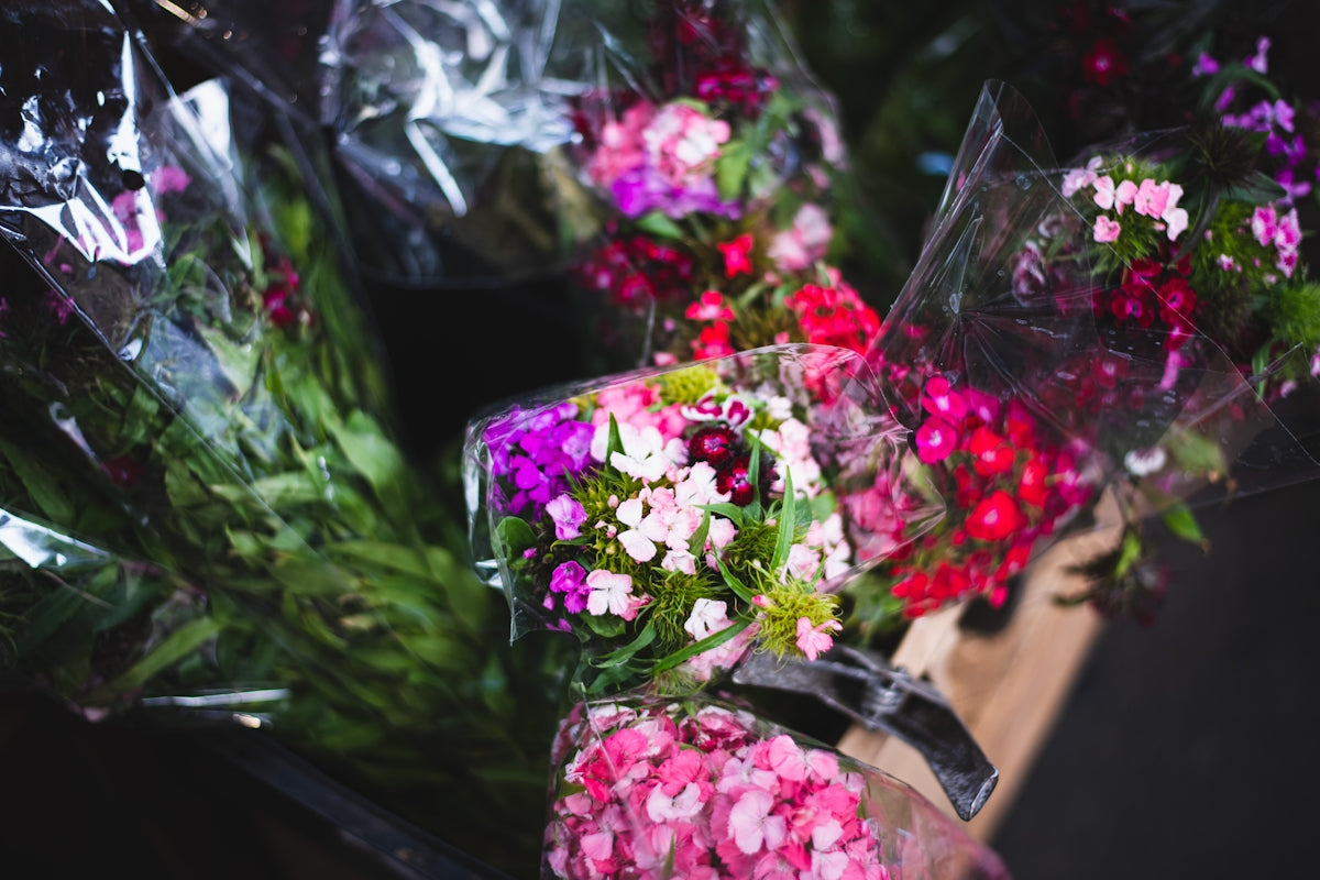 a bunch of flowers that are sitting on a table