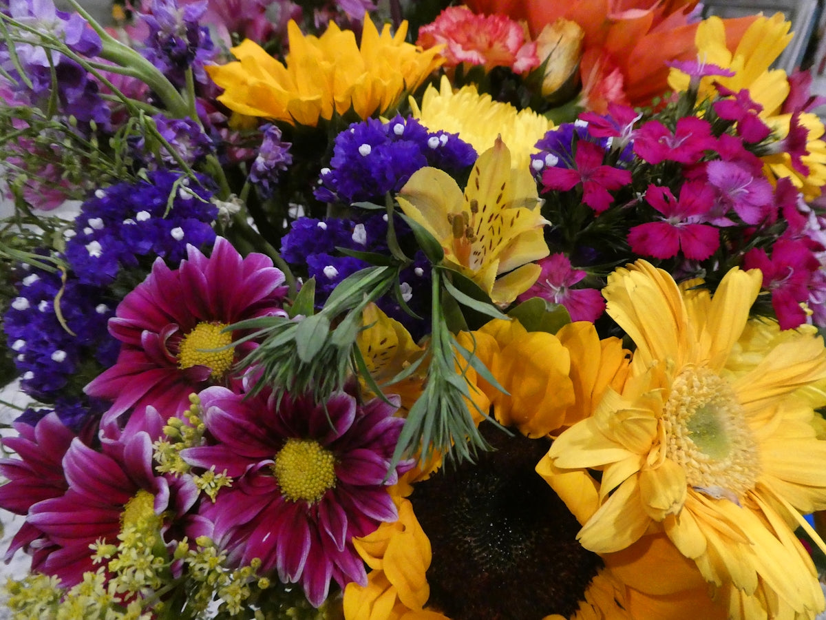 A beautiful, colorful bouquet of mixed flowers.