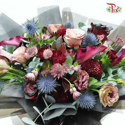 Assorted Flowers In Gorgeous Black Hand Bouquet